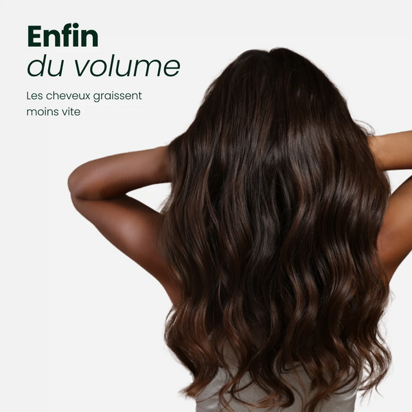 femme avec des cheveux volumineux