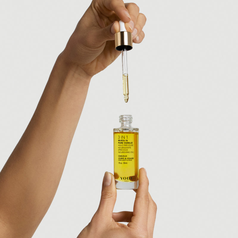 personne utilisant huile muesli yodi avec pipette couleur